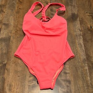 Victoria’s Secret One piece Coral bathing suit. Never worn.